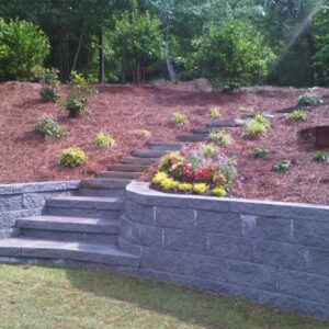 Hardscape retaining wall and landscaping