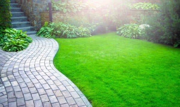 Paver Walkway Next to a Lawn