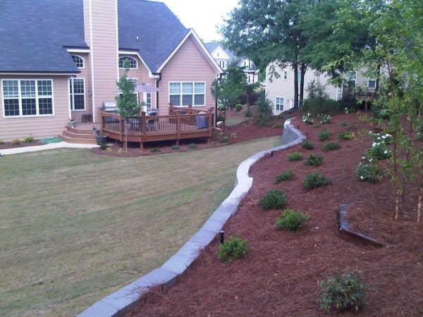 Landscaping project including a retaining wall installation