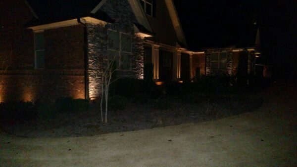 Exterior home with landscape lighting