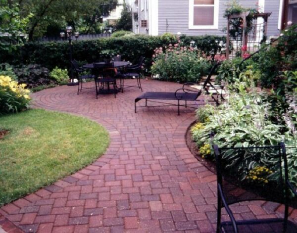 Paver Walkway leading to a Patio
