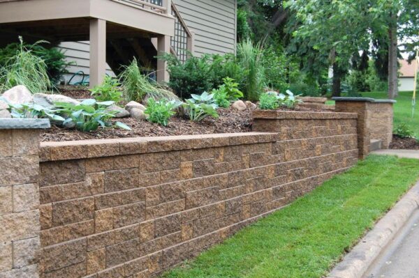 Stacked Paver Retaining Wall with a flower bed in the top